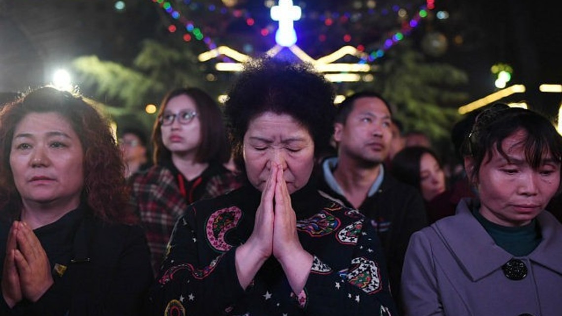 Beijing China Christians Pray Lights Getty 18 640x480